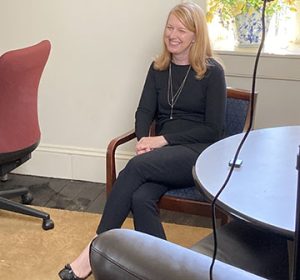 Woman sitting in chair