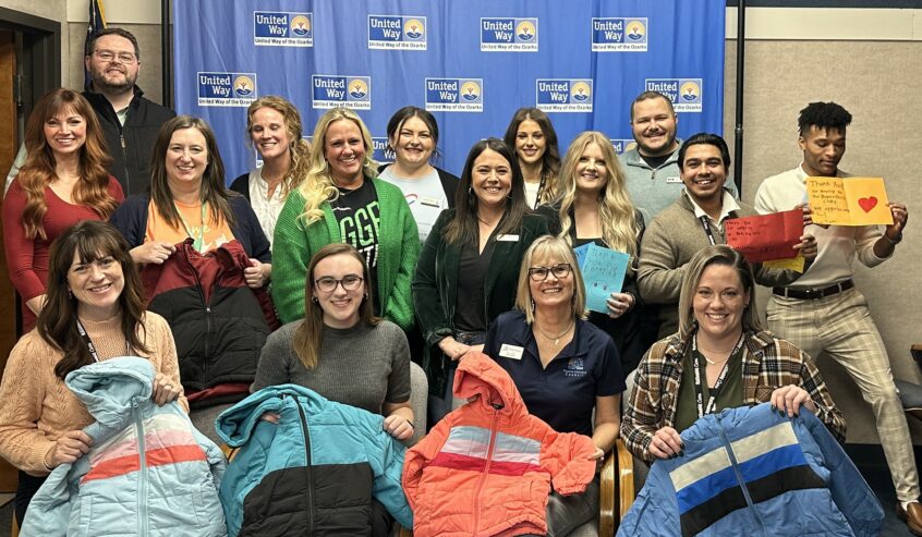 Representatives from Reliable Subaru and United Way of the Ozarks' nonprofit partners celebrate donation of 500 children's coats
